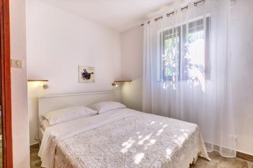 Postel nebo postele na pokoji v ubytování Eco Secluded apartments Zabodarski