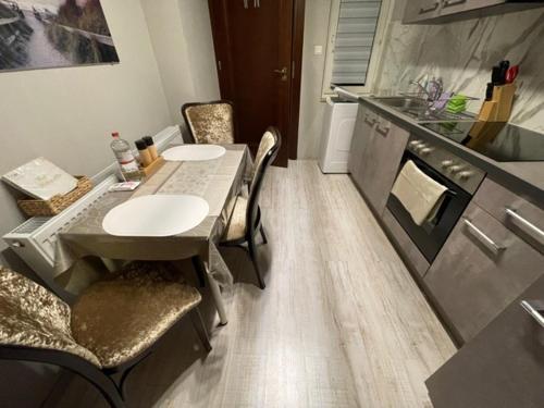 Gemütliche Apartment Lucky und Lucky de Luxeにあるキッチンまたは簡易キッチン