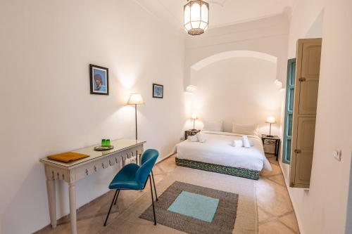 Säng eller sängar i ett rum på Riad Agathe & Spa
