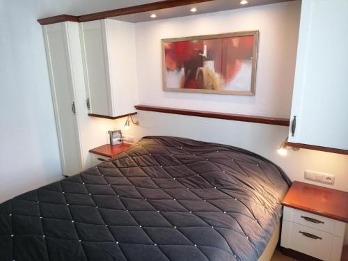 Postel nebo postele na pokoji v ubytování Sylter-Besserburg-App-3
