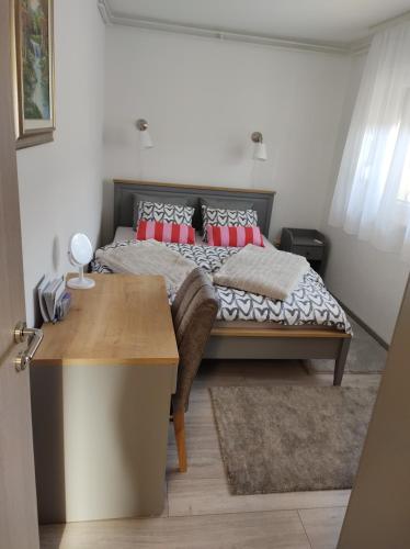 Postel nebo postele na pokoji v ubytování Happy Apartment