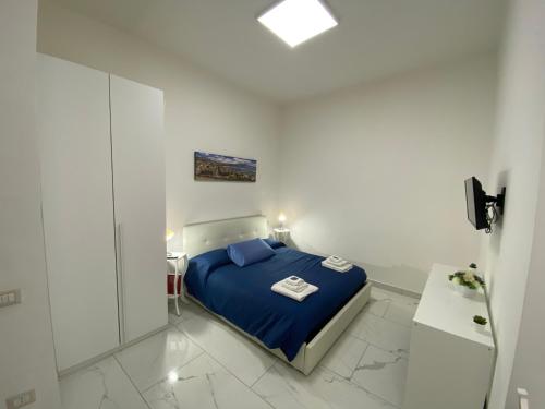Posteľ alebo postele v izbe v ubytovaní Conforti Apartment