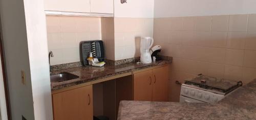 Kuchyň nebo kuchyňský kout v ubytování Apartamentos no Lexus Beira Mar