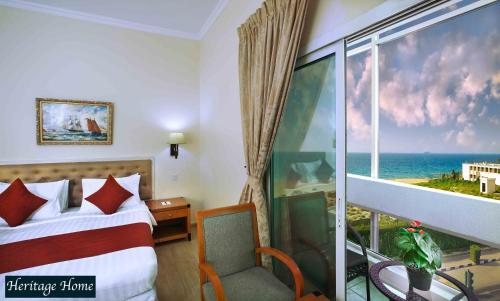 Postel nebo postele na pokoji v ubytování Al Seef Hotel