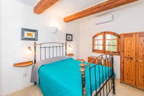 Ένα ή περισσότερα κρεβάτια σε δωμάτιο στο Ta Tumas