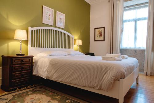 Katil atau katil-katil dalam bilik di Feel Discovery Casa Da Capela Douro Valley Armamar
