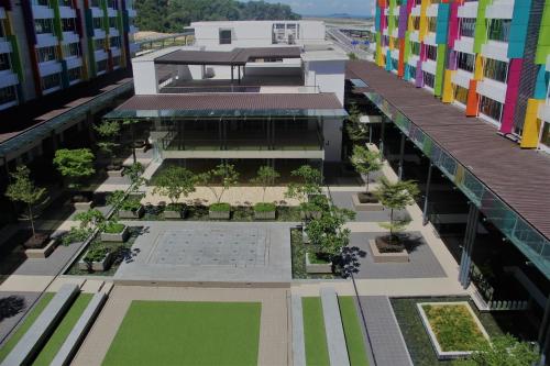 an aerial view of the courtyard of a building at KK Aeropod Corner unit A near Airport and City Free Parking in Kota Kinabalu