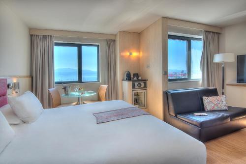 Postel nebo postele na pokoji v ubytování Mercure Ajaccio