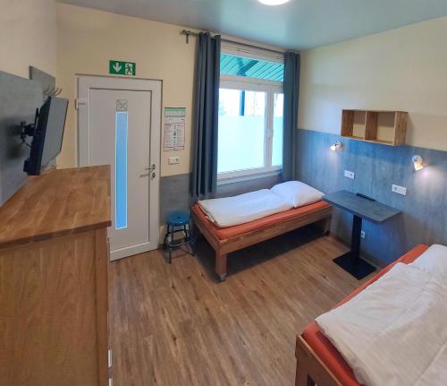 Cama o camas de una habitación en Hotel-Pension Schlafpunkt in Solingen