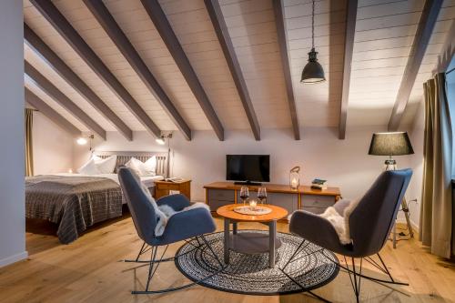 Postel nebo postele na pokoji v ubytování MANA LISA Boutiquehotel