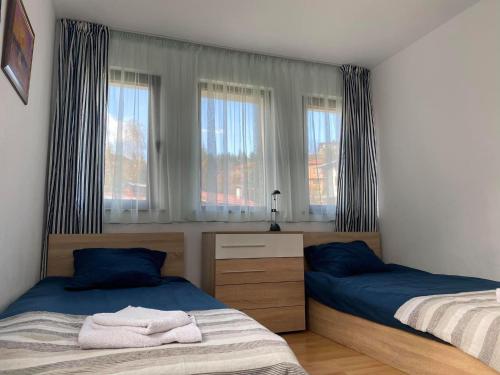 Postel nebo postele na pokoji v ubytování Stoykite Escape House