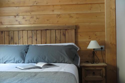 Postel nebo postele na pokoji v ubytování Apartamentos Casa Pochetas