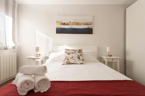 Tempat tidur dalam kamar di Apartamento Zoraida Centro