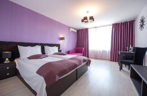 Katil atau katil-katil dalam bilik di One by One - by Grand Accommodation
