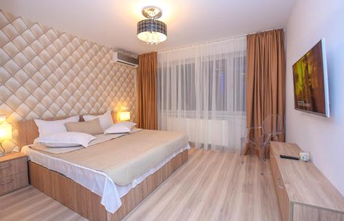 Katil atau katil-katil dalam bilik di One by One - by Grand Accommodation