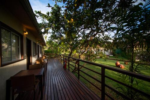 a porch of a house with a wooden deck at Pousada Lua Bela in Fernando de Noronha