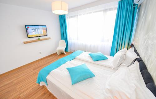 Katil atau katil-katil dalam bilik di One by One - by Grand Accommodation