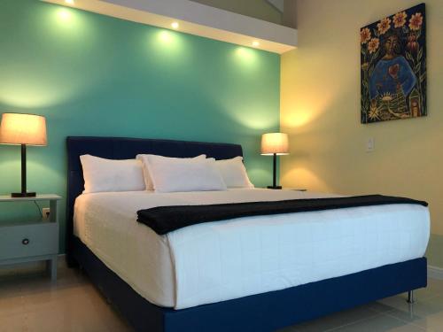 Ένα ή περισσότερα κρεβάτια σε δωμάτιο στο Quints Travelers Inn