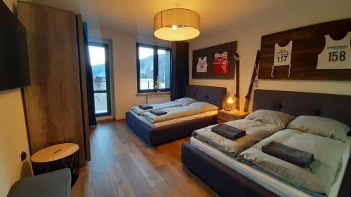 Posteľ alebo postele v izbe v ubytovaní Dom Minimal House