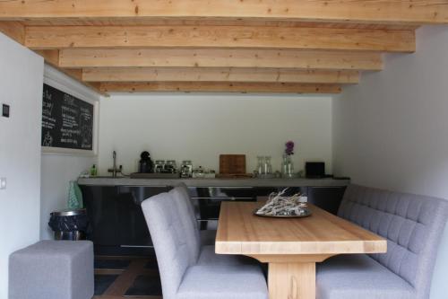 Posezení v ubytování B&B en Boshuis Darthuizerpoort