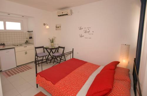 Katil atau katil-katil dalam bilik di Apartments Barka