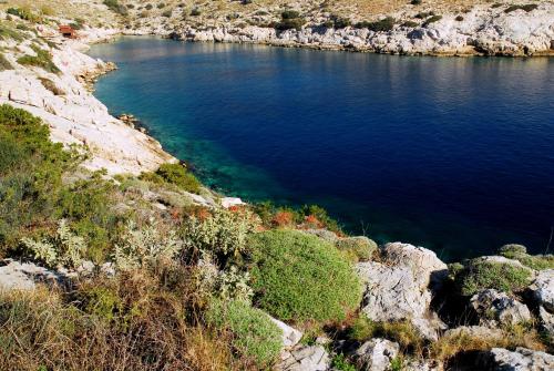 a large body of water on the side of a mountain at Amazing Apartment in Athens