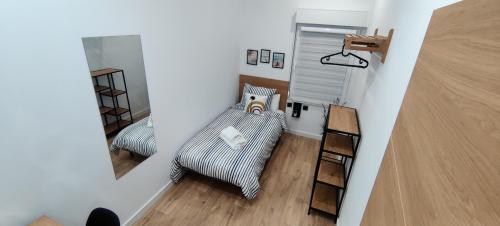 Een bed of bedden in een kamer bij New Apartment Claret