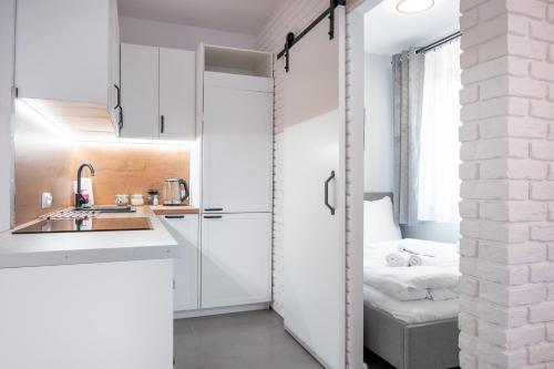 Phòng tắm tại Apartament na Wzgórzu 4 Sauny, ebike, las, widok - 5D Apartamenty