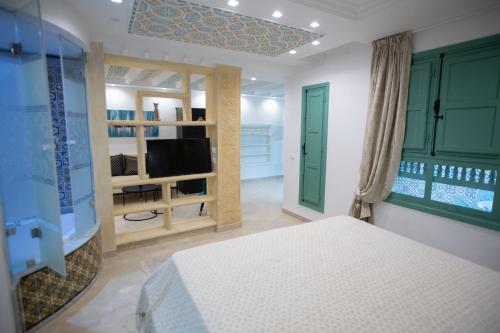 TV/Unterhaltungsangebot in der Unterkunft Dar Hammamet Guest House & Hammam