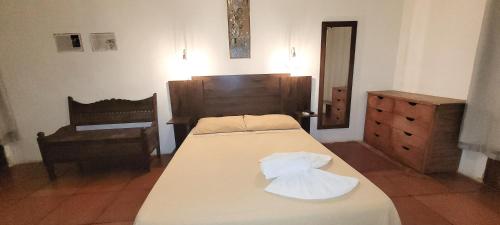 Imbassaí Pousada Hostel Lujimbaにあるベッド
