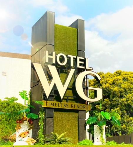 a hotelww sign in front of a building at Hotel Water Gate Narita (Adult Only) in Narita