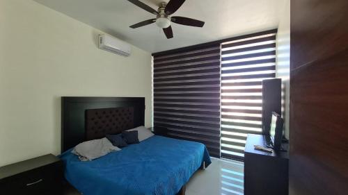 Postel nebo postele na pokoji v ubytování Casa en la playa