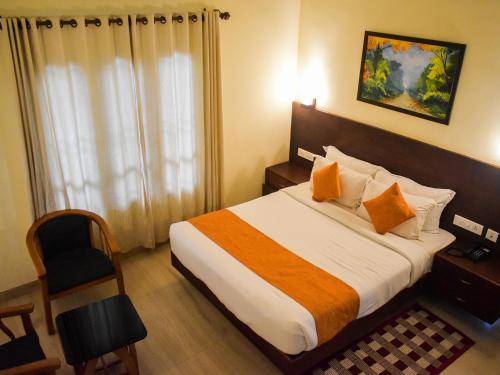 Postel nebo postele na pokoji v ubytování Indeevara Luxury Resort and Spa, Wayanad