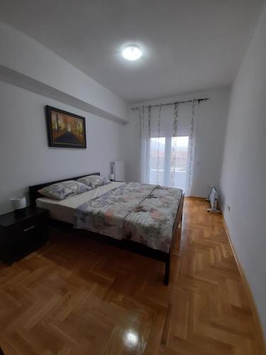 Postel nebo postele na pokoji v ubytování Apartman Green wood