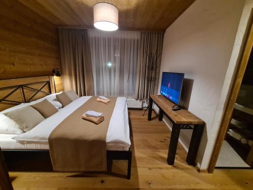 Cama o camas de una habitación en Chalets VIVA Jasná