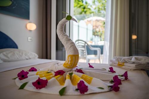 Voodi või voodid majutusasutuse Hotel Villa dei Fiori - sul mare con piscina toas