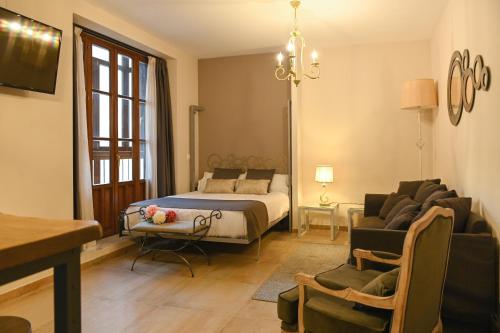 Postel nebo postele na pokoji v ubytování Palacete 1620, Premium Suites, Only adults