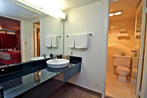 a bathroom with a sink and a toilet at Motel 6-Sallisaw, OK in Sallisaw