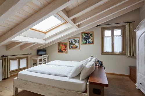 Postel nebo postele na pokoji v ubytování Agriturismo Alba Del Borgo
