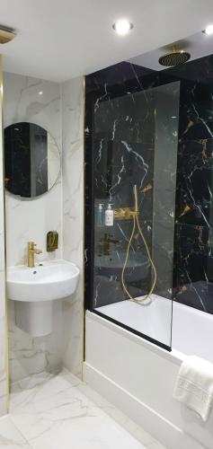 Ванная комната в Vkm Apartments
