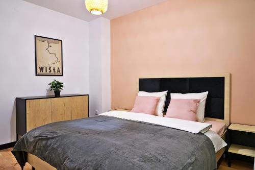 Ένα ή περισσότερα κρεβάτια σε δωμάτιο στο Apartament Alina 25