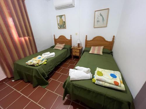 เตียงในห้องที่ 5 bedrooms villa with private pool enclosed garden and wifi at Aroche Huelva