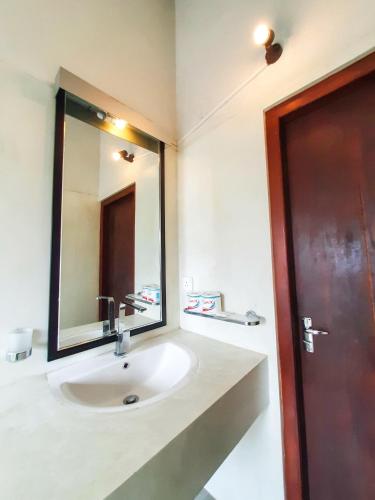 Un baño de Unawatuna Guest
