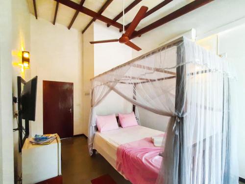 Cama o camas de una habitación en Unawatuna Guest