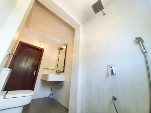 Un baño de Unawatuna Guest