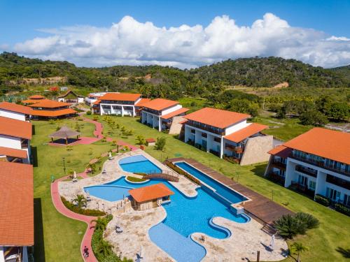 an aerial view of a resort with a swimming pool at Club Meridional Praia dos Carneiros - Perto da Igrejinha in Praia dos Carneiros