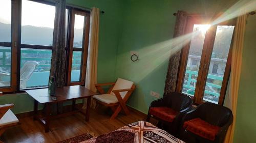 Posezení v ubytování Nanda View Cottage