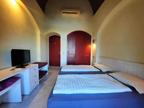 Ένα ή περισσότερα κρεβάτια σε δωμάτιο στο Villa Melody - Holiday home in El Gouna