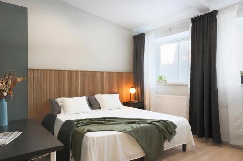 Katil atau katil-katil dalam bilik di Foundry Hotel Apartments