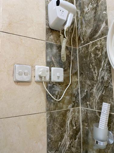 Koupelna v ubytování فندق ليالي العرب